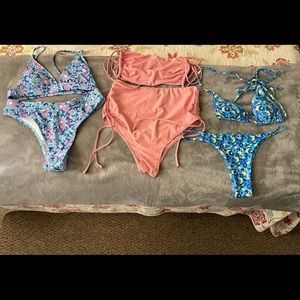 selling bathing suits Second picture there is 1 lace missing for the underwear.